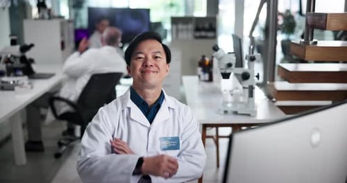 Doctor Smiling in Bright Research Laboratory
