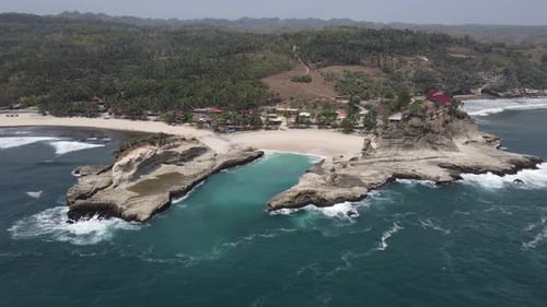 aerial view of Klayar Beach which has the charm of white sand and beautiful white coral in Pacitan,