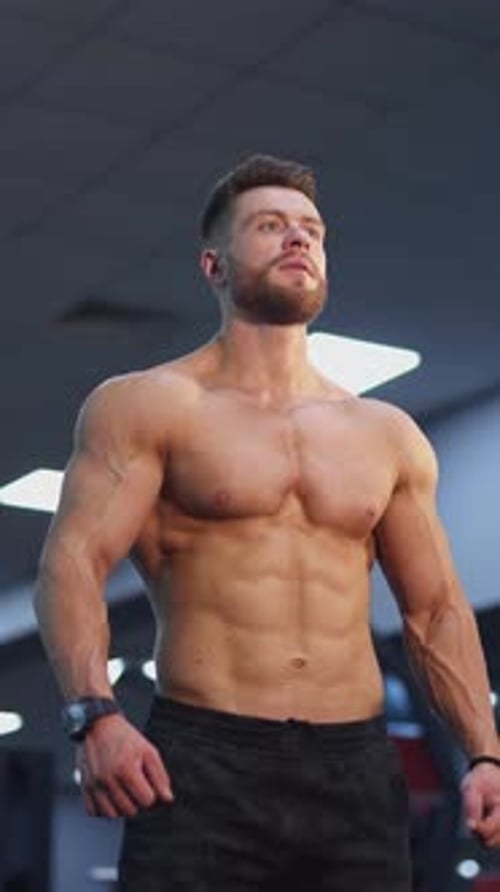 Muscular Man Posing in Gym, Fitness Training