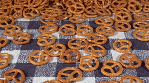Delicious Golden Brown Pretzels on Checkered Tablecloth