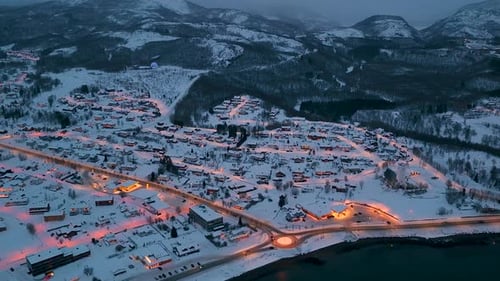 Aerial View Of Snowy Lofoten Village At Twilight In Norway