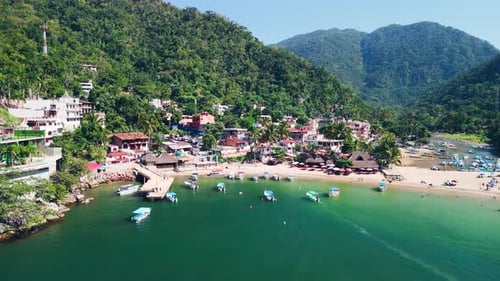 Drone approaching the town of Boca de Tomatlan, mexican beach in Puerto Vallarta