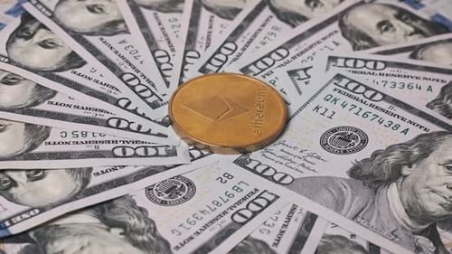Ethereum Coin Centered on US Dollar Bills