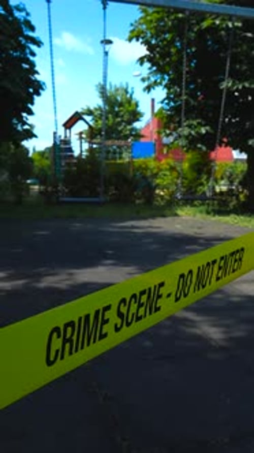 Empty Playground Blocked by Crime Scene Tape