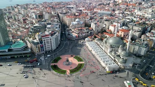 Taksim Square with the Golden Horn as a picturesque backdrop, drone fly above