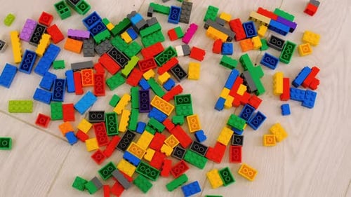 Aerial of Colorful Plastic Building Blocks on Floor