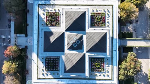 USA government building with rooftop gardens and cones. Aerial top down rising shot above North Caro