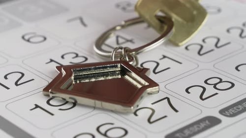 Calendar with House Key and Date Marked