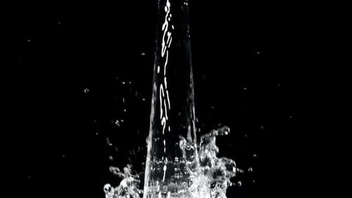 Water Pouring and Splashing on Black Background