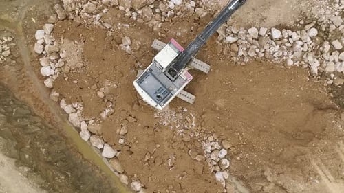 Foundation Formation Aerial of Soil Unloading at Construction Site
