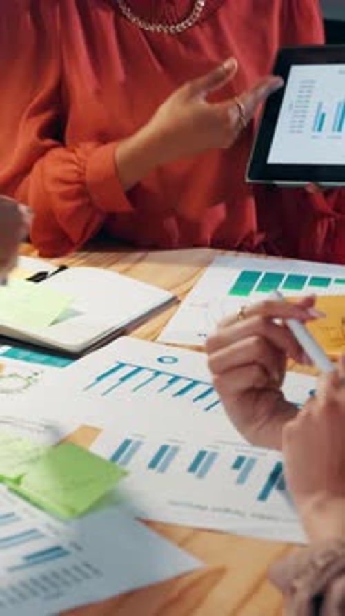 Office, tablet screen and hands with paperwork, discussion or collaboration for data analysis