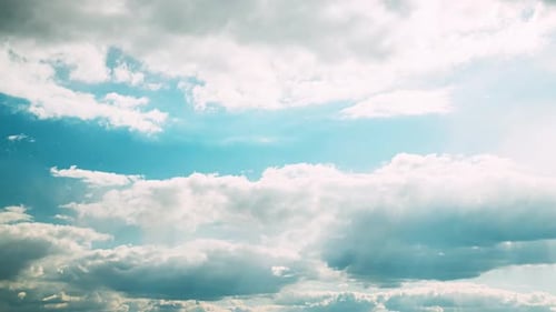 Time Lapse of Clouds Drifting Across Blue Sky