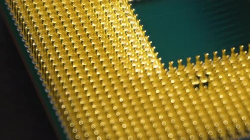 Yellow and green central processing unit (CPU), slow pan, extreme close up