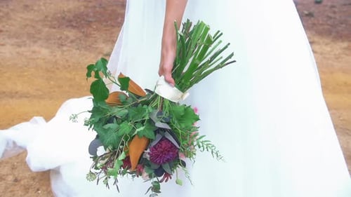 Bride Holding Wedding Flower Bouquet Close Up