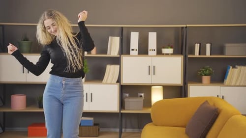 Dancing happy woman.