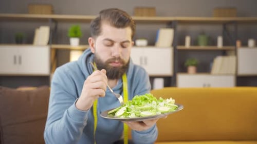 Unhappy dieting man.