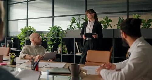 Business Meeting Presentation in Modern Office