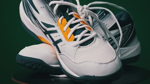 Close Up of Sporty White Athletic Shoes Rotating