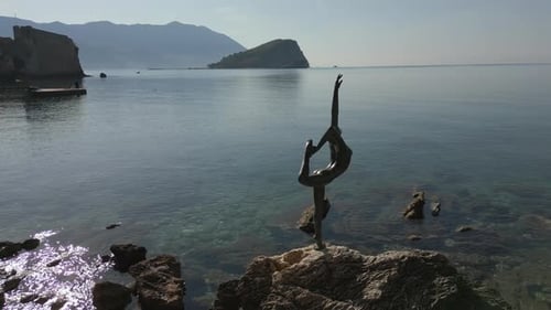 Statue of a ballerina in Budva. Old town of Budva sights.