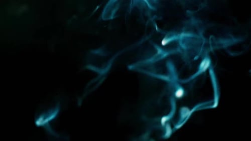 Abstract Blue Smoke Plumes on Black Background