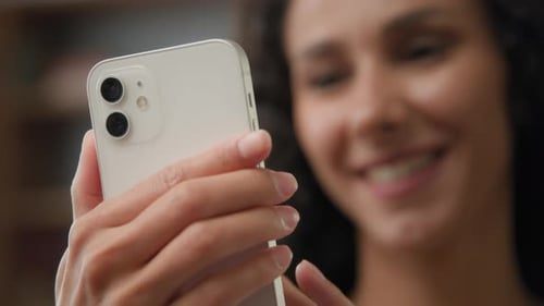 Close Up Blurred Adult Caucasian Smiling Female Woman Holding Mobile Phone Typing Swipe Browsing