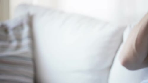 Close Up of Man with Tablet Pc Computer and Earphones Listening To