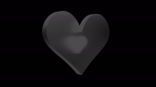 Gray Heart Rotates Against Black Background