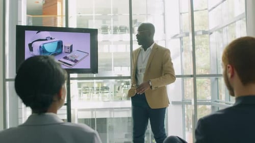 Worker Pitching Presentation with New Product