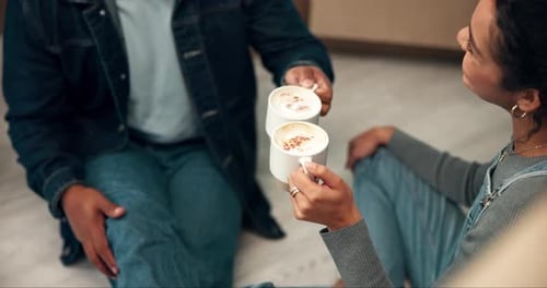Young Adults Enjoying Coffee in a Home Setting
