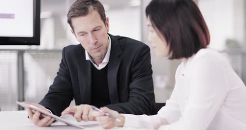 Corporate business meeting using a digital tablet
