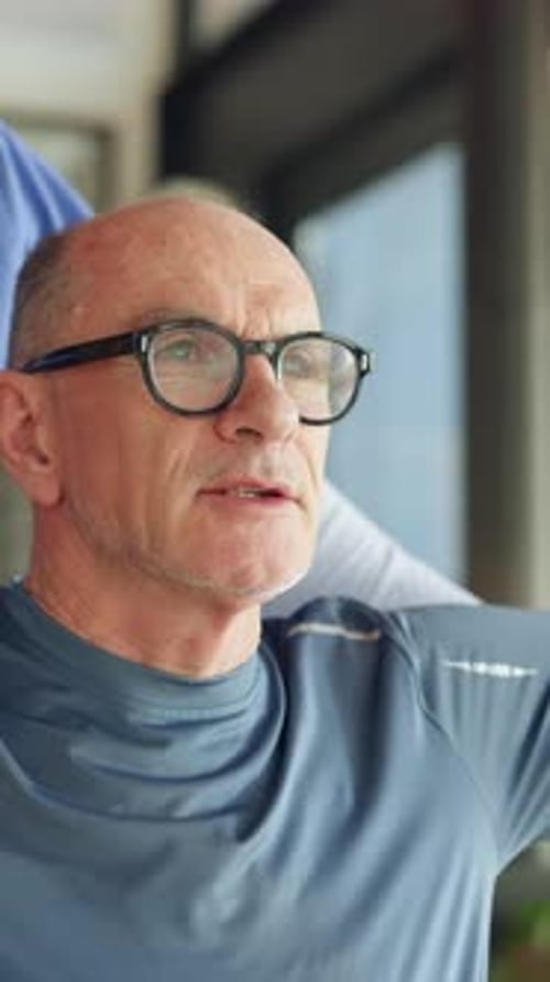 Consulting, physiotherapy or recovery with chiropractor and old man in clinic for healthcare