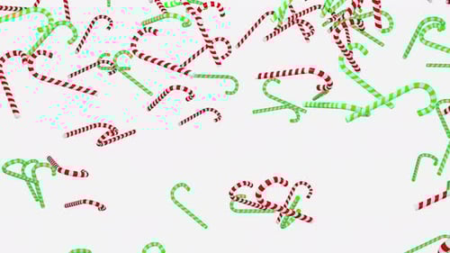 Falling dawn candy cane isolated on white background 3d render. Green and red candy cane drops