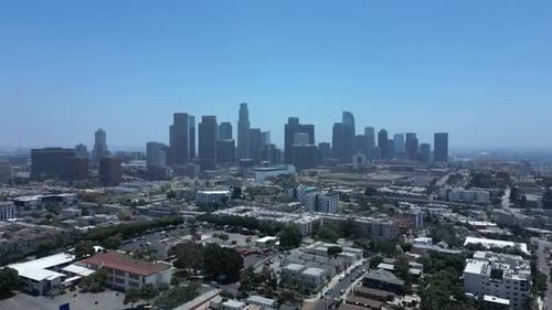 60FPS Drone Flying Over Los Angeles Houses with Skyline View