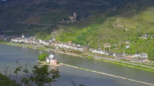 Picturesque Rhine Valley landscape on the Rhine River and a small village on the riverbank, Kaub