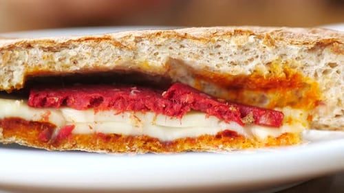 Slice of Chicken Sandwich on Plate Close Up