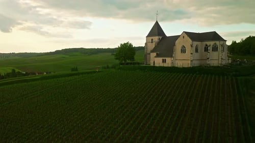 Aerial View of Charming Little Church in a Small Village in France Surrounded By Vineyards