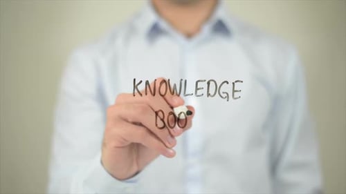 Knowledge Boost Man Writing on Transparent Screen