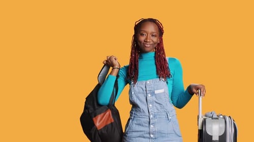 Young Cheerful Adult Leaving on Holiday