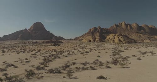 Aerial view of rocky desert landscape with mountains, Namibia.