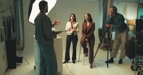 Studio director, creative team and discussion for photography production or planning photoshoot