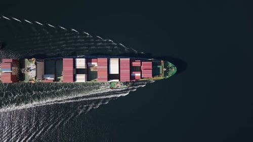 Top View OF FREIGHT SHIP WITH CONTAINERS ENTERING HALIFAX HARBOUR CANADA