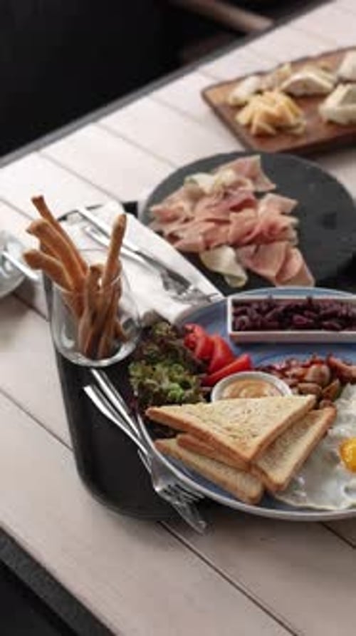 Breakfast Spread with Toast, Eggs, and Bacon