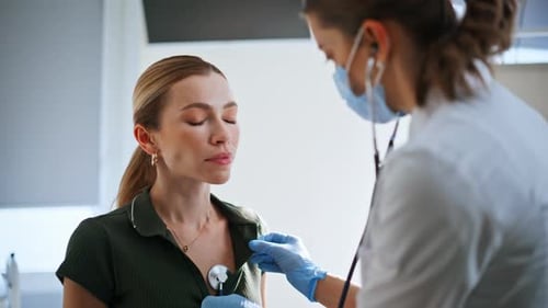 Lady Doctor Using Stethoscope During Health Checkup Sick Woman Visiting Clinic
