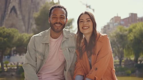 Young multiethnic couple visiting and dating in the center of Barcelona