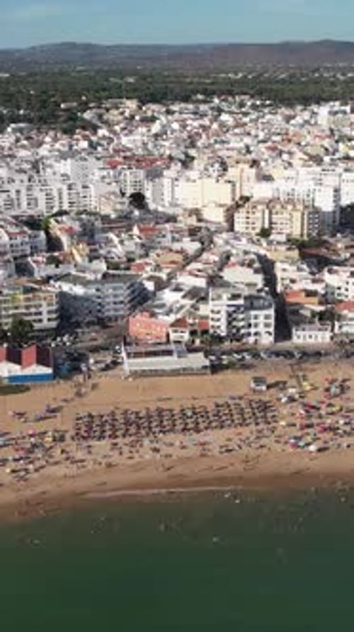 Vertical Video of City and Beach in Quarteira. Algarve, Portugal