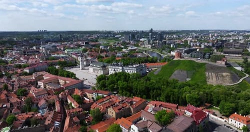 Cinematic Establishing Drone Shot Above Vilnius Old Town with Modern Skyscrapers in Background
