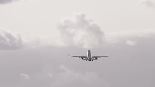 Airplane Taking Off into Overcast Sky