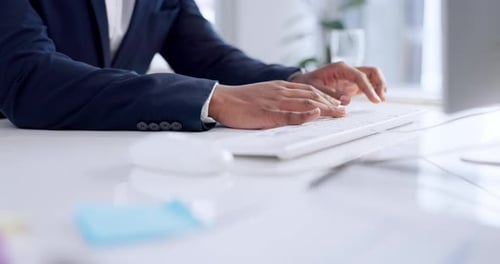 Business man, hands and typing on computer to review legal research, information