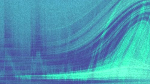 Blurry abstract background with blue and green shades.