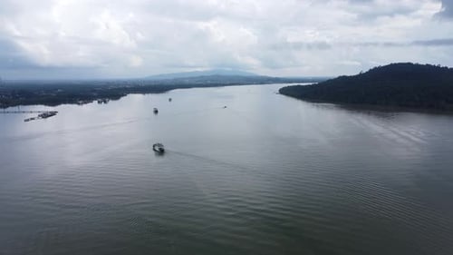 Ferries carry passengers sailing on the Kalimantan sea
